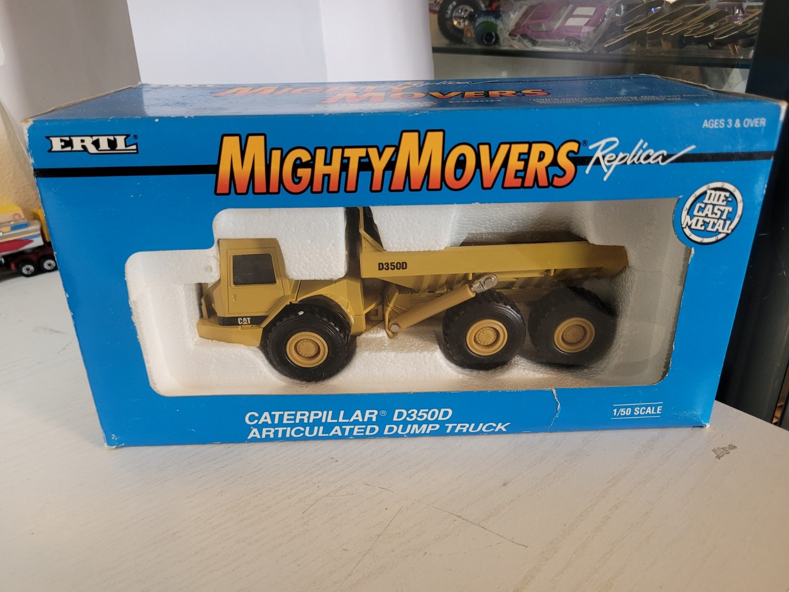 Mighty Movers Replica, ERTL CAT D350D Articulated Dump Truck, New