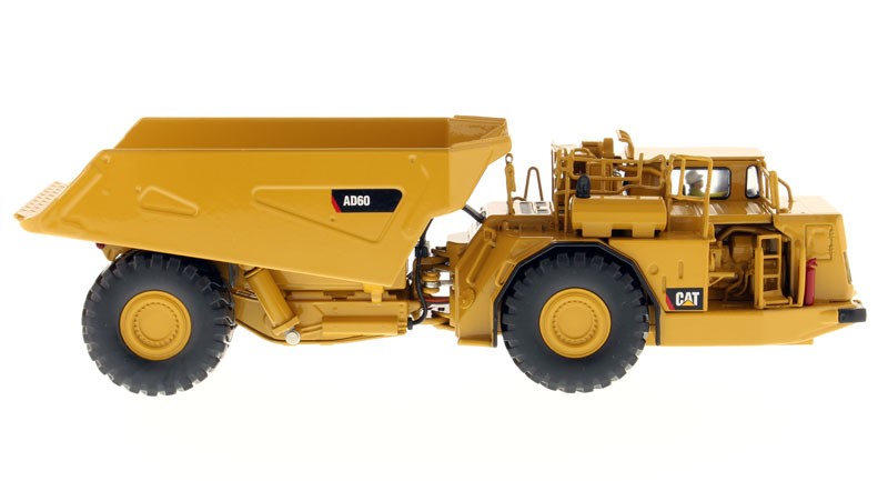 DIECAST MASTERS,Dumper CATERPILLAR AD60 tunnel boring machine with driver and…
