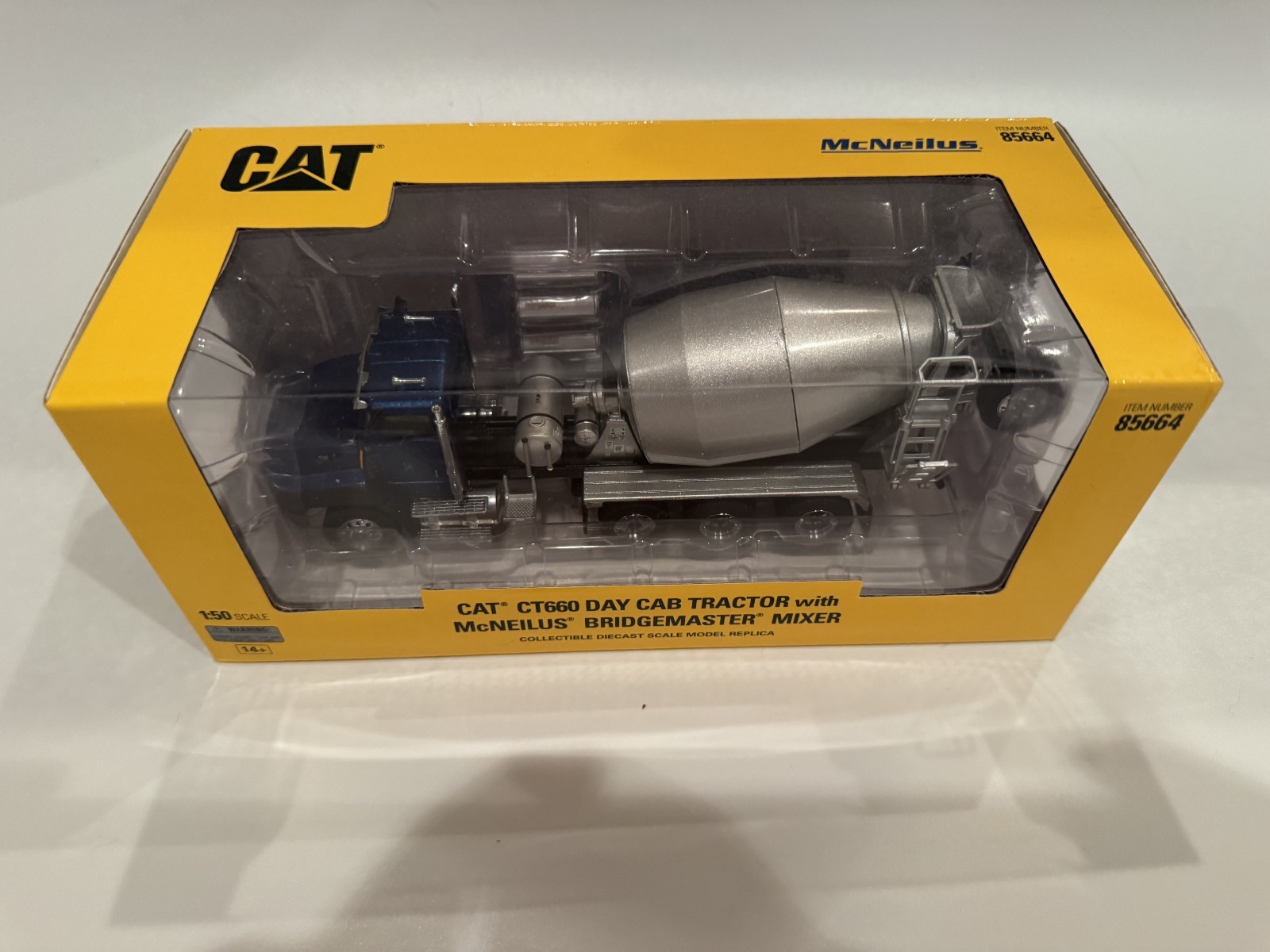 Diecast Masters 85664 CAT CT660 McNeilus Bridgemaster Concrete Mixer 1:50 New