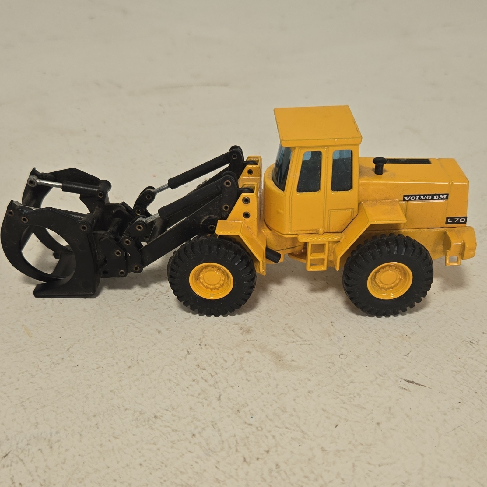 Joal Volvo BM L70 Wheel Loader w/ Grapple Articulated 1:50 Diecast 971/03