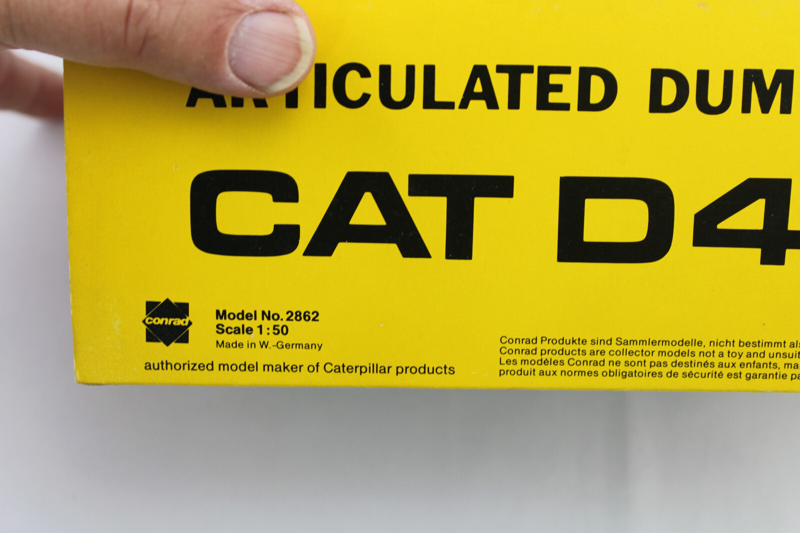 Diecast – Conrad 2862 – CAT D400 – Articulated Dump Truck
