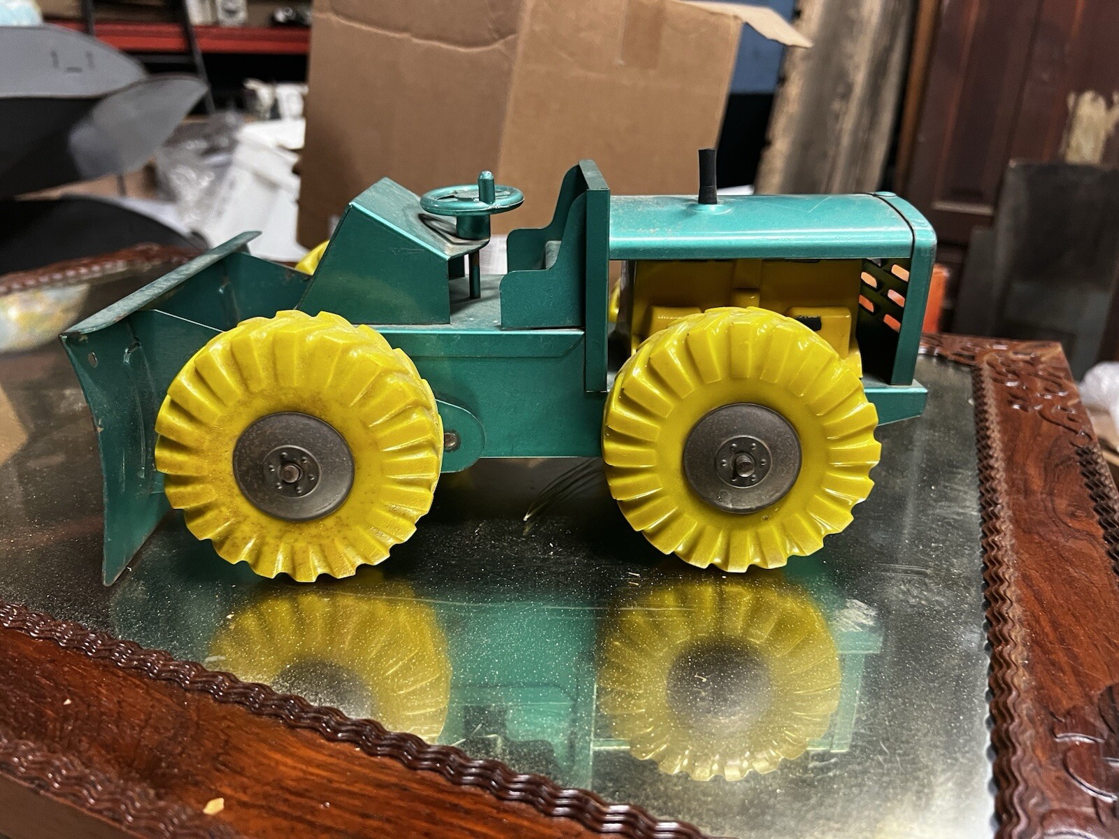 Vintage green Structo Bulldozer, Pressed Steel 12” long -original has play wear