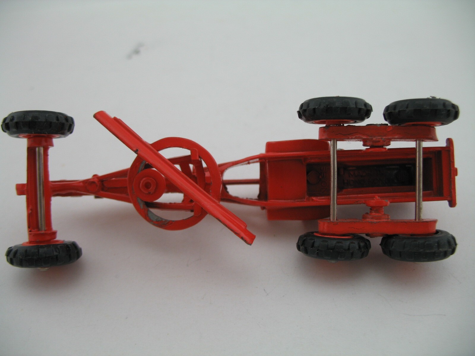 Mini Dinky Model 99: Caterpillar Grader, with Garage Box