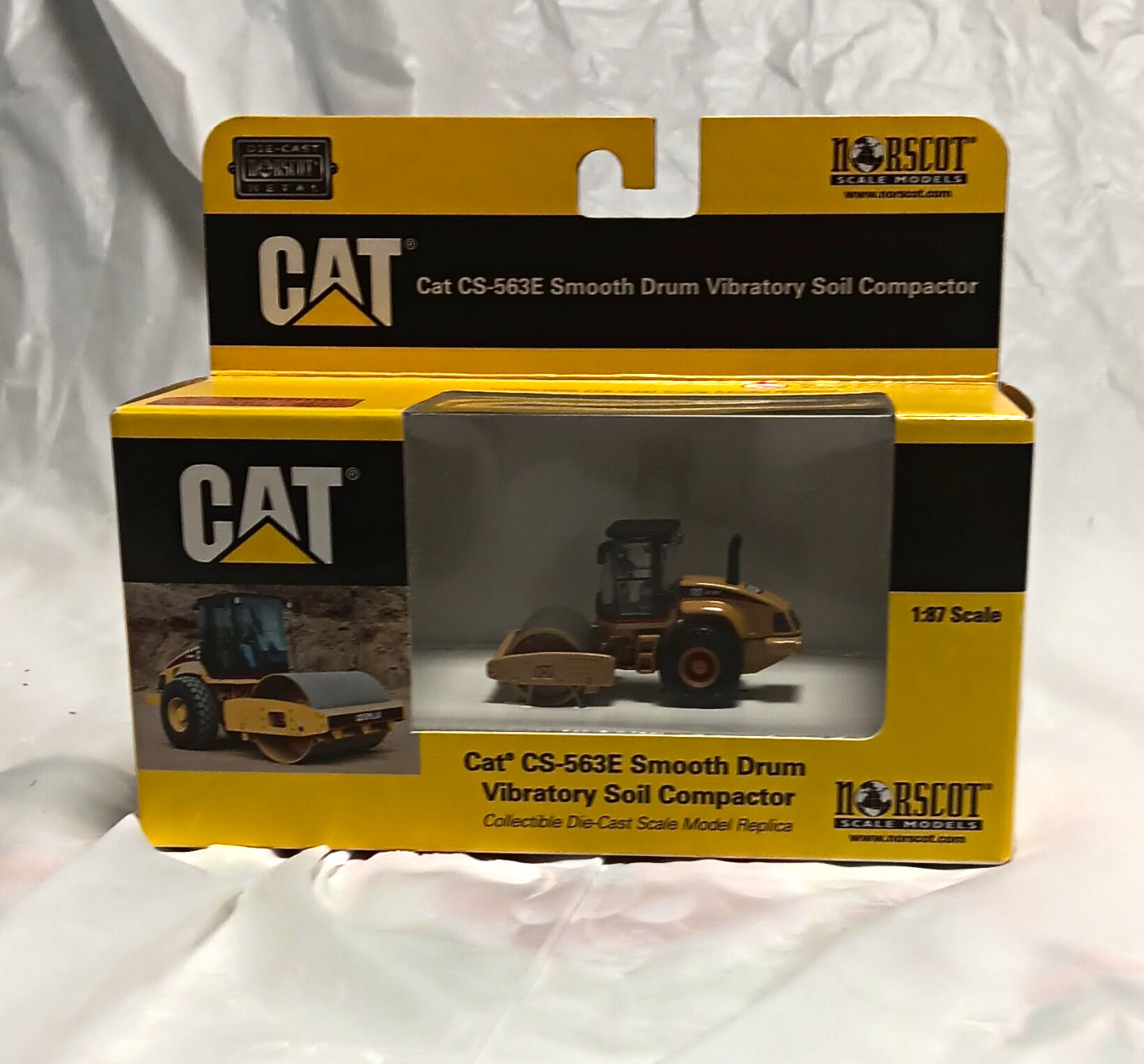 Norscot CAT CS-563E Soil Compactor 1:87 Yellow/Black Diecast Unopened 55155