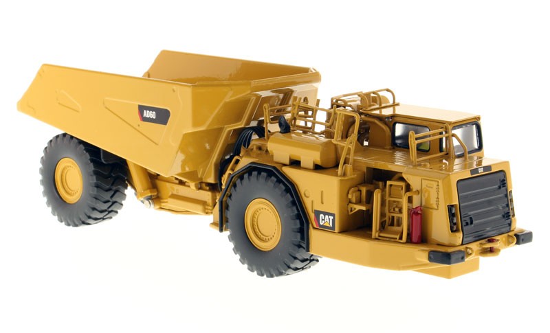 DIECAST MASTERS – CATERPILLAR AD60 dumper tunnel boring machine with driver and box met…