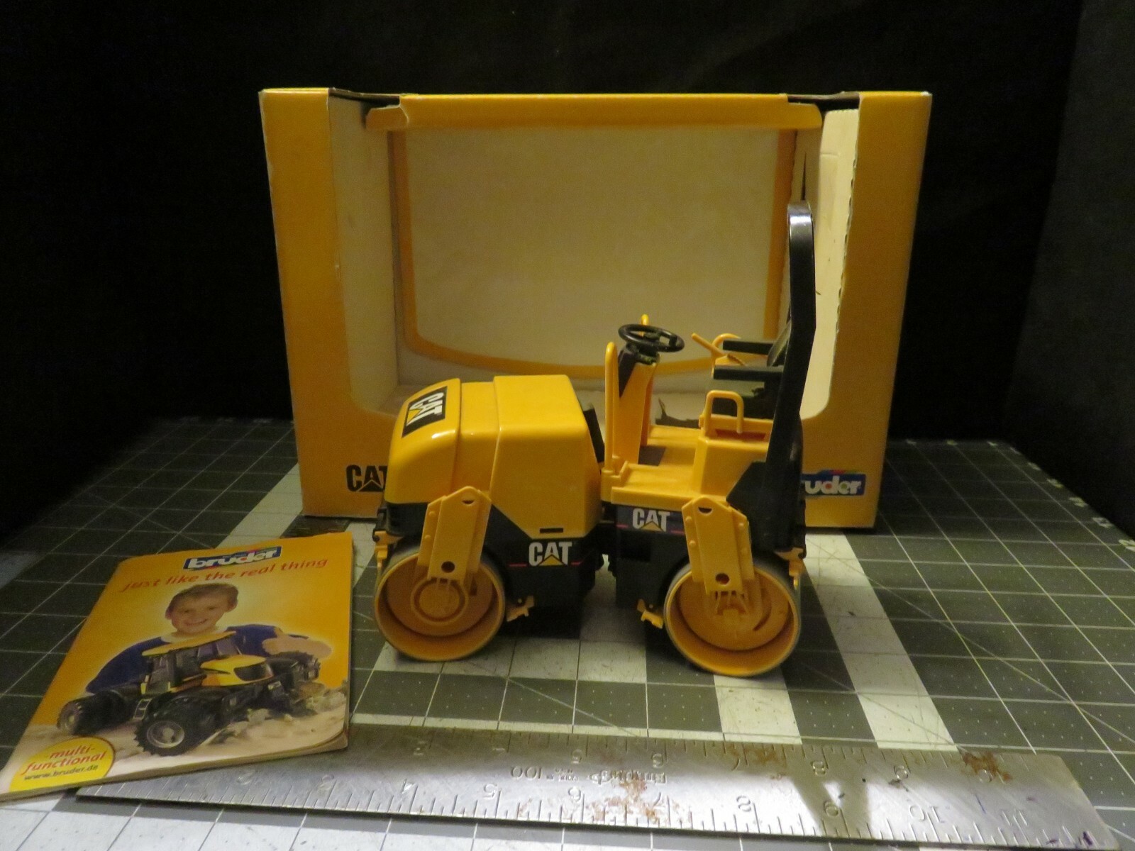 Bruder #02434 1:16 Scale Cat Asphalt Drum Compactor NOS