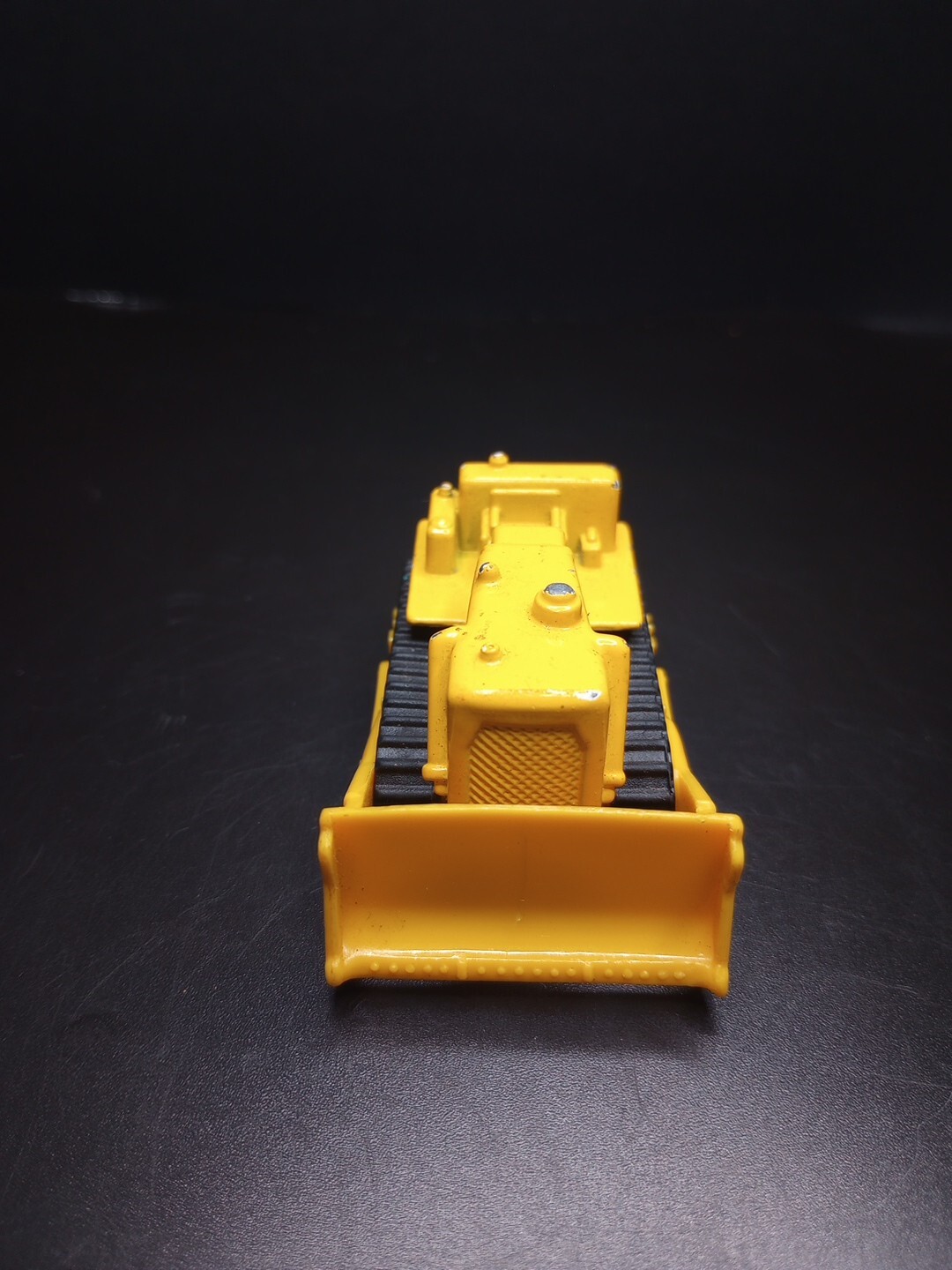 Yellow Die-Cast Tonka Bulldozer + (another) Bulldozer + Hot Wheels Dog Fighter