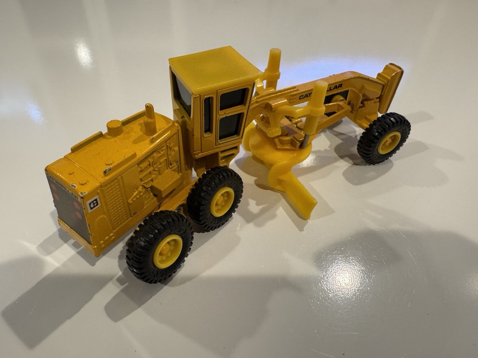 Ertl – Mighty Movers – Caterpillar CAT Motor Grader – 1:64 Scale