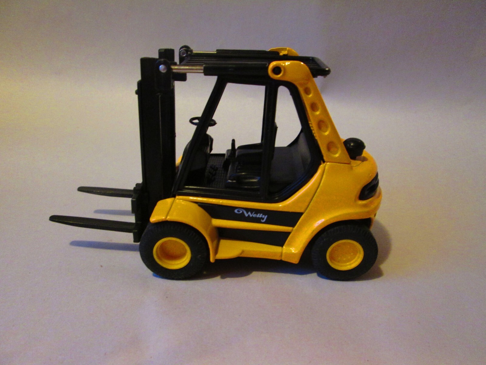Welly Diecast Friction Skid Loader or Forklift Tractor #2010