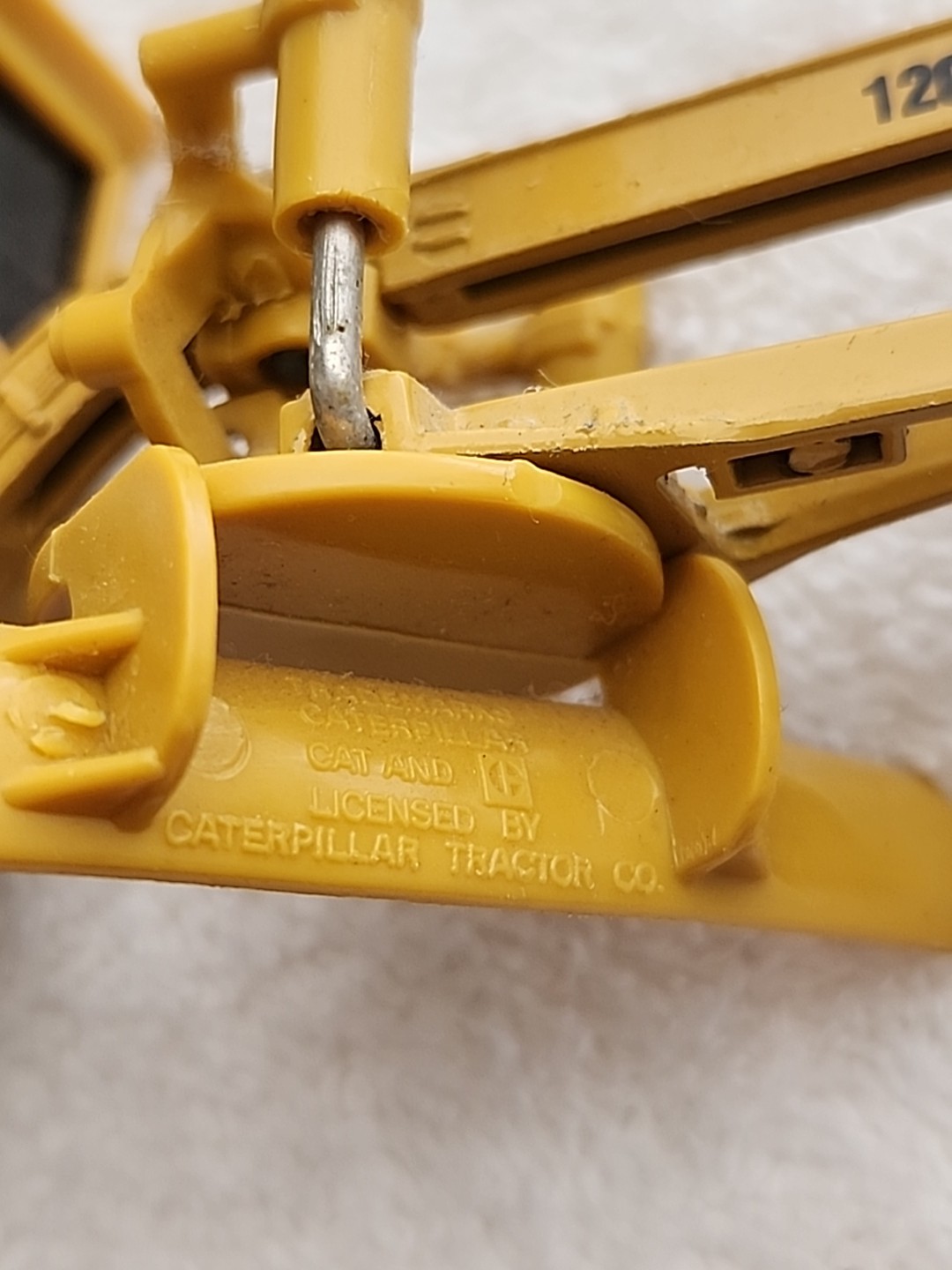 Caterpillar Cat 12G Motor Grader – Ertl 1:50 Scale Diecast Model All Wheels Move