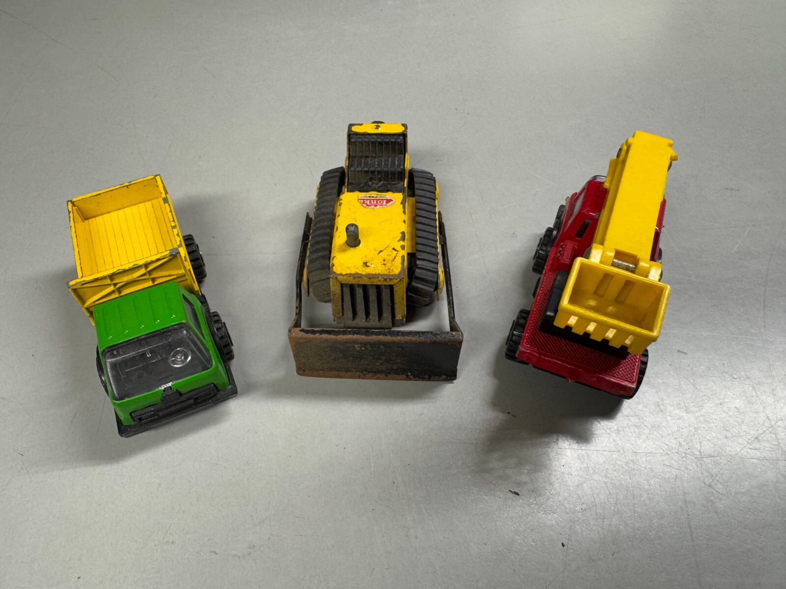 Vintage Tonka Construction Toys: Bulldozer + Cherry Picker + Dump Truck – 4in