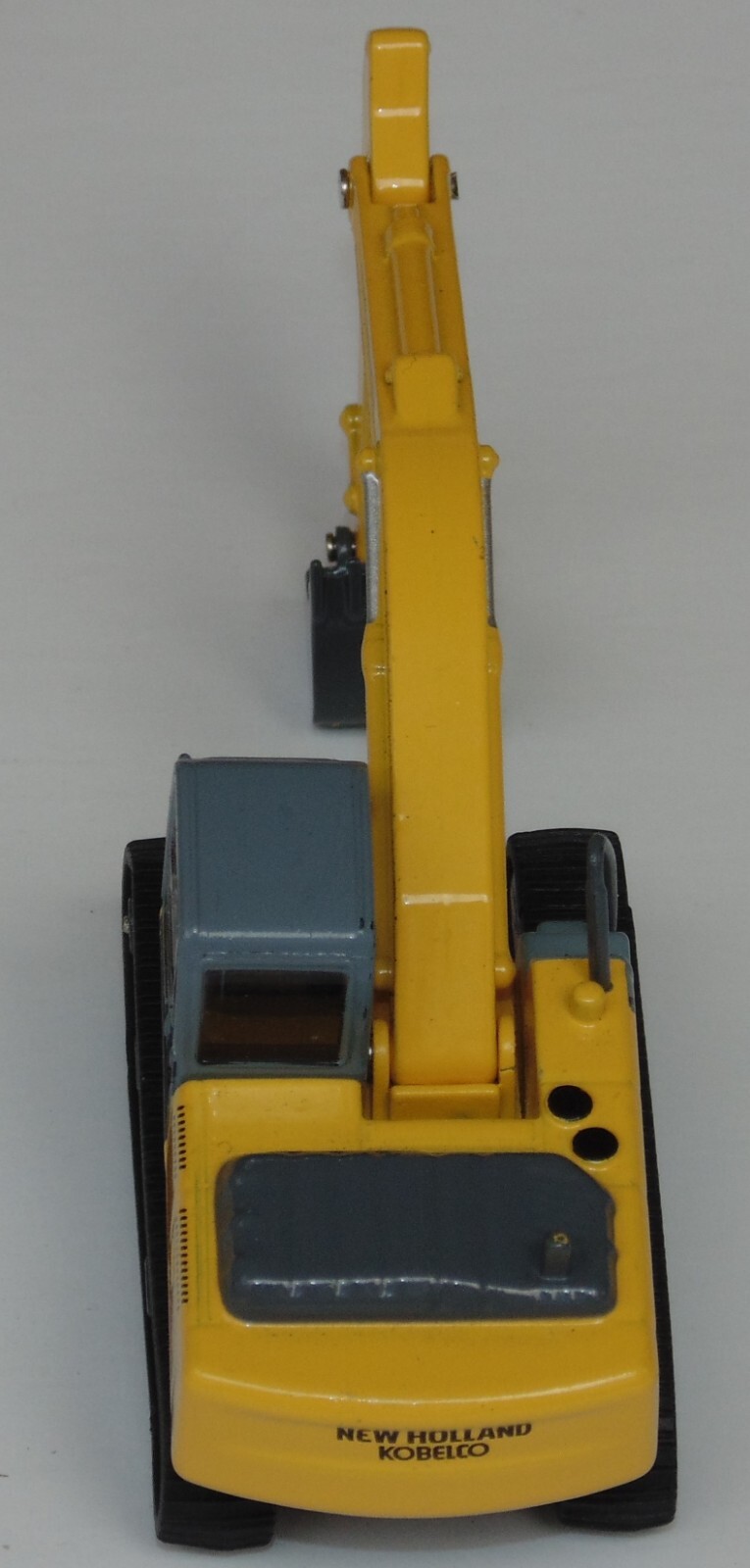 NEW HOLLAND E215B RETROEXCAVA MAQUINARIA PARA CONSTRUCCION 1:87 DIECAST COLOMBIA