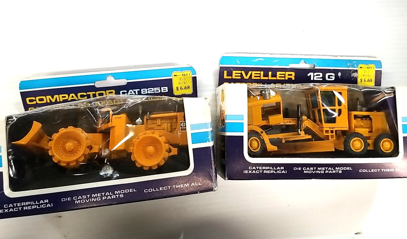 Two Joal 1:50 Caterpillar 825B (# 218) & 12G (#217) (box 100b)