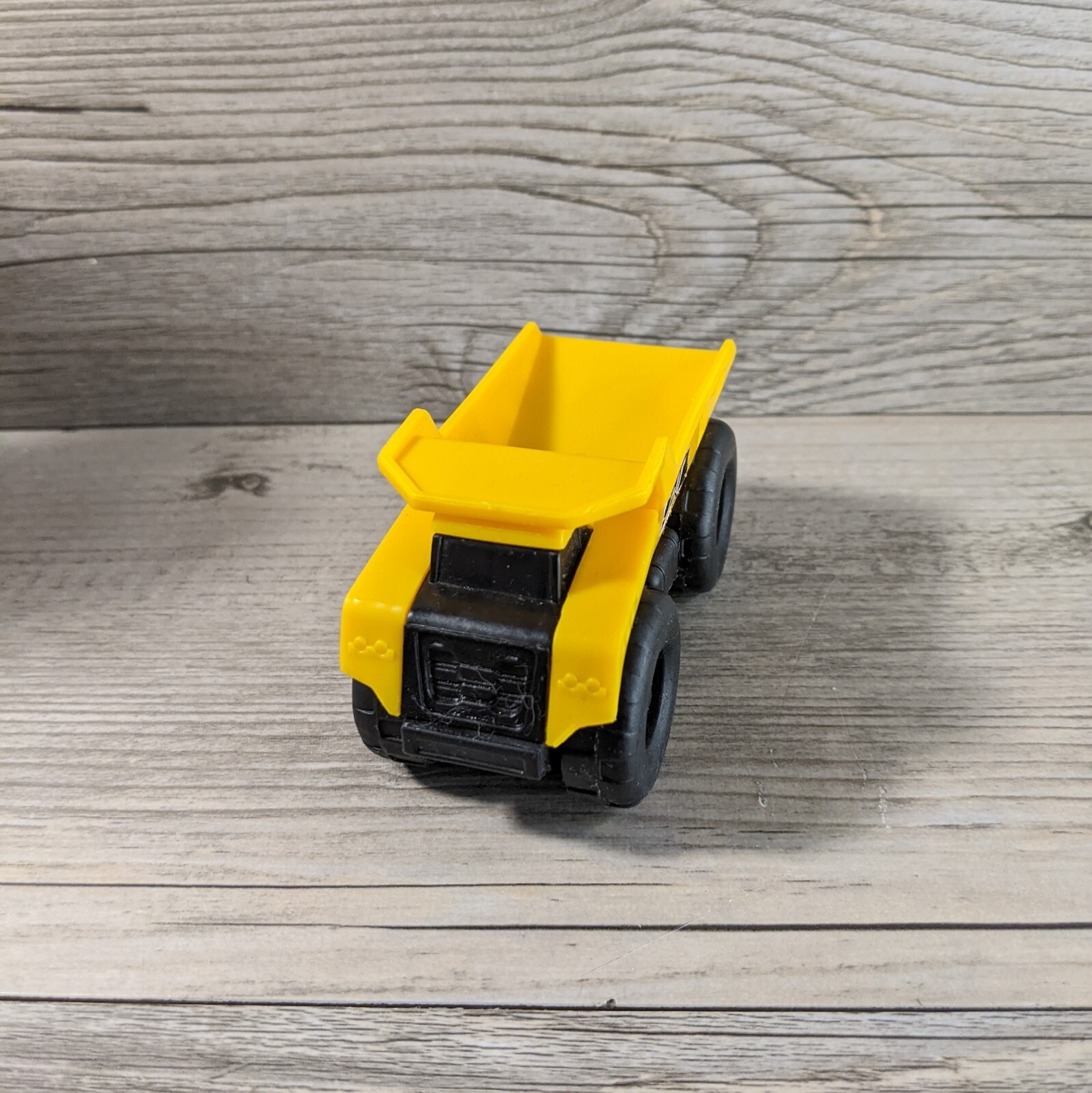 Mini Machine CAT Yellow Dump Truck Construction Vehicle 3.5″ Long Plastic