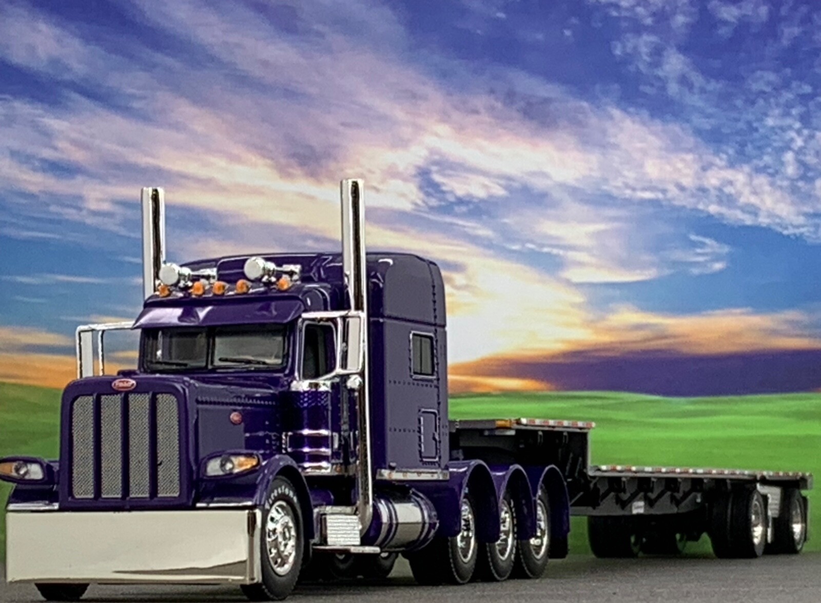 1/64 DCP PETERBILT 389 TRI AXLE W/ 70″ MID ROOF & TRANSCRAFT STEPDECK TRAILER