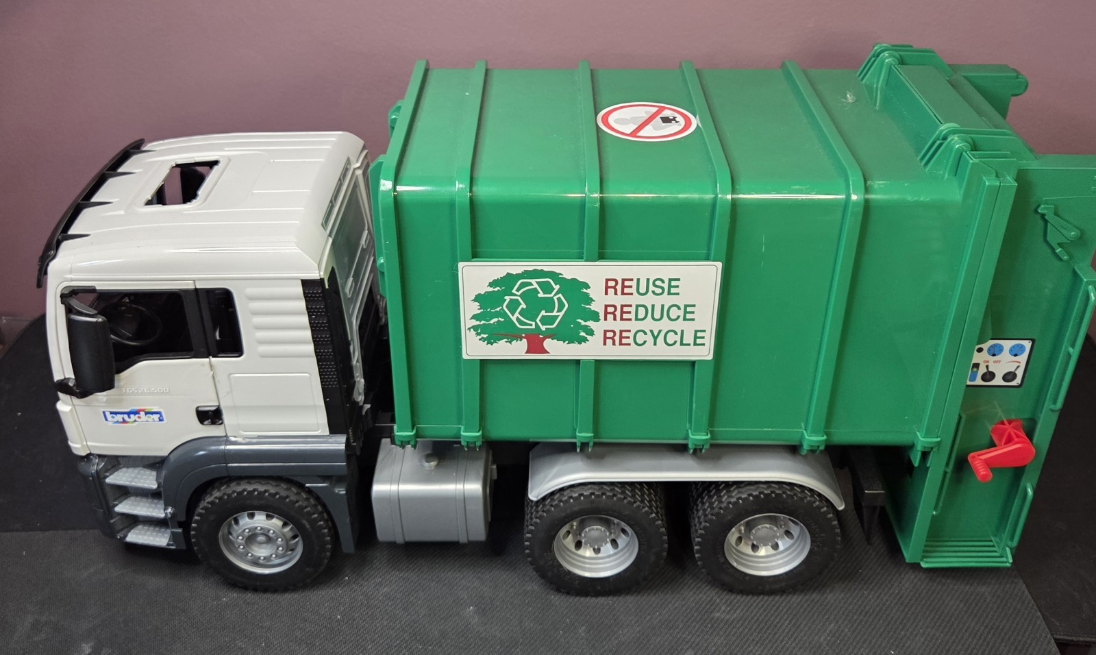 BRUDER MAN TGS Rear Loading Garbage Truck Green