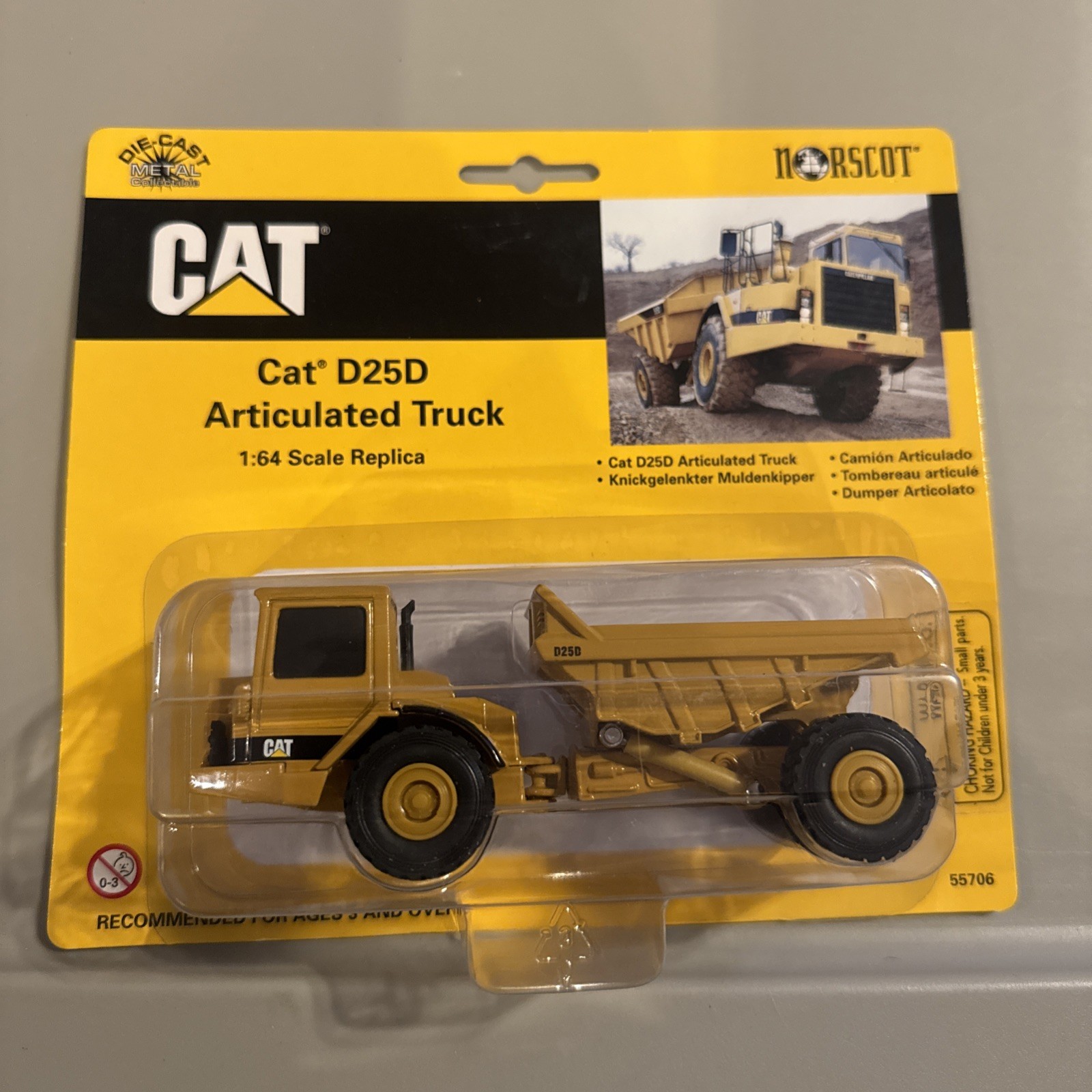 Norscot CAT Caterpillar D25D Die-Cast Articulated Truck 1/64 – NIB