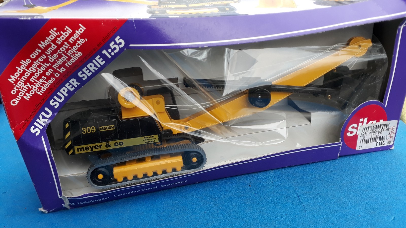 Siku 3518 – CATERPILLAR M500H “Meyer & Co” Excavator 1:55