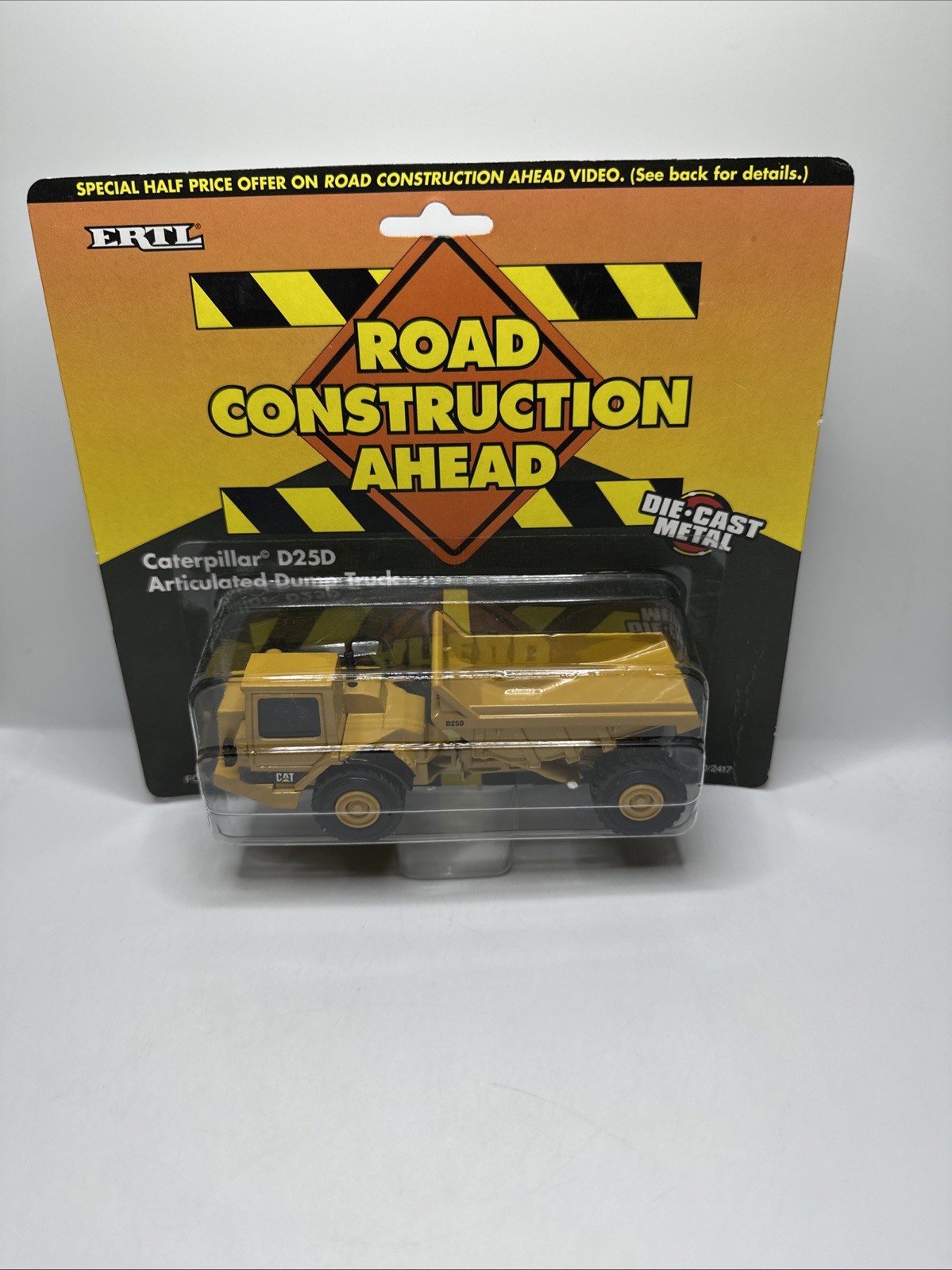 Vintage Ertl Road Construction Caterpillar D25D Articulated Dump Truck, 1995 NEW