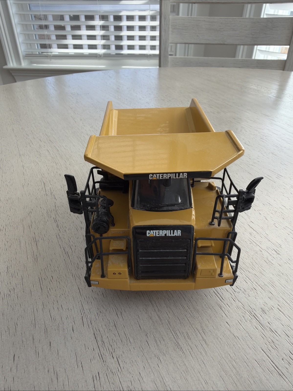 Caterpillar Cat 772 Off-Highway Dump Truck – Norscot 1:50 Scale