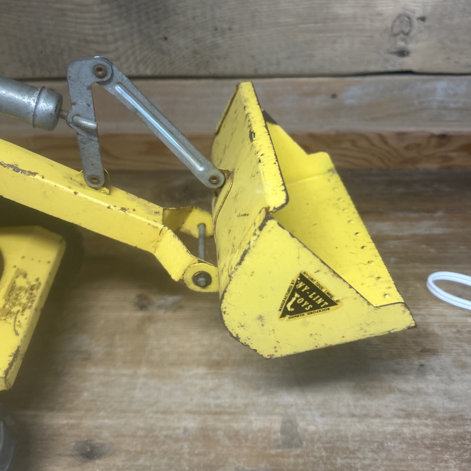 NyLint Pettibone Mulliken Speed Swing Loader vtg 1950s pressed steel