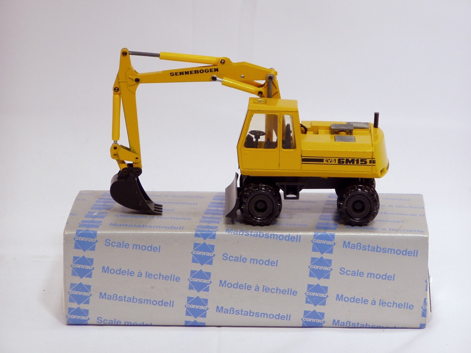 Sennebogen SM15 EVS Wheel Excavator – 1/50 – Conrad #28187 – N.MIB