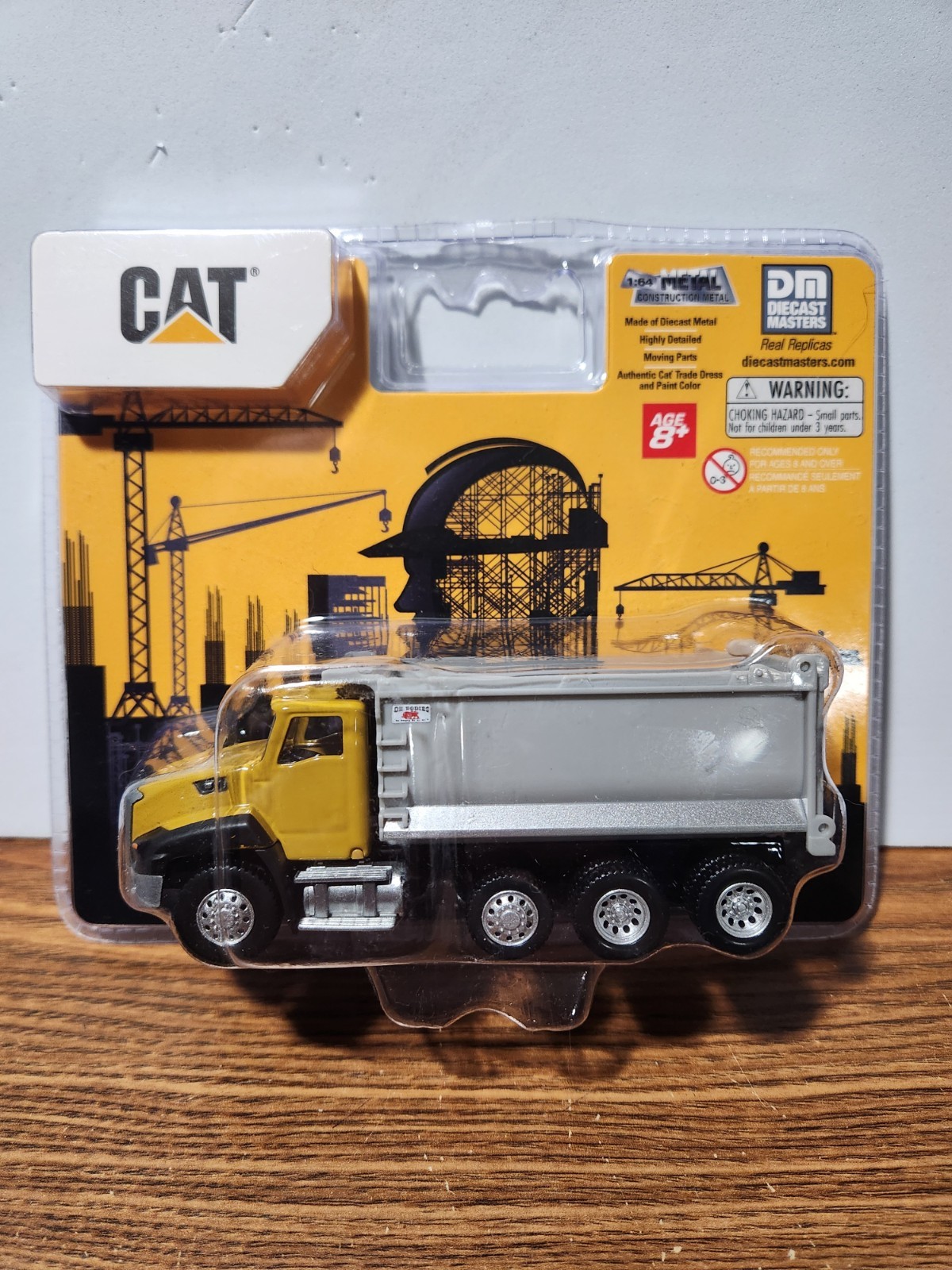 Diecast Masters 1/64 Caterpillar CT660 Dump Truck with Ox Dump Body 84643CS