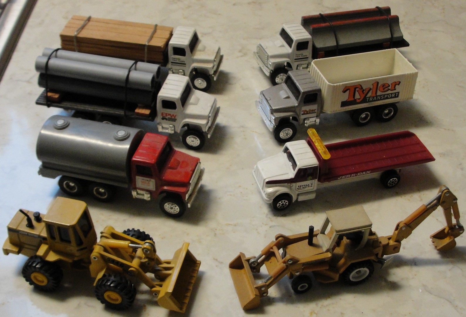 Lot of 8 Assorted Ertl Construction Vehicles – Very Good Condition