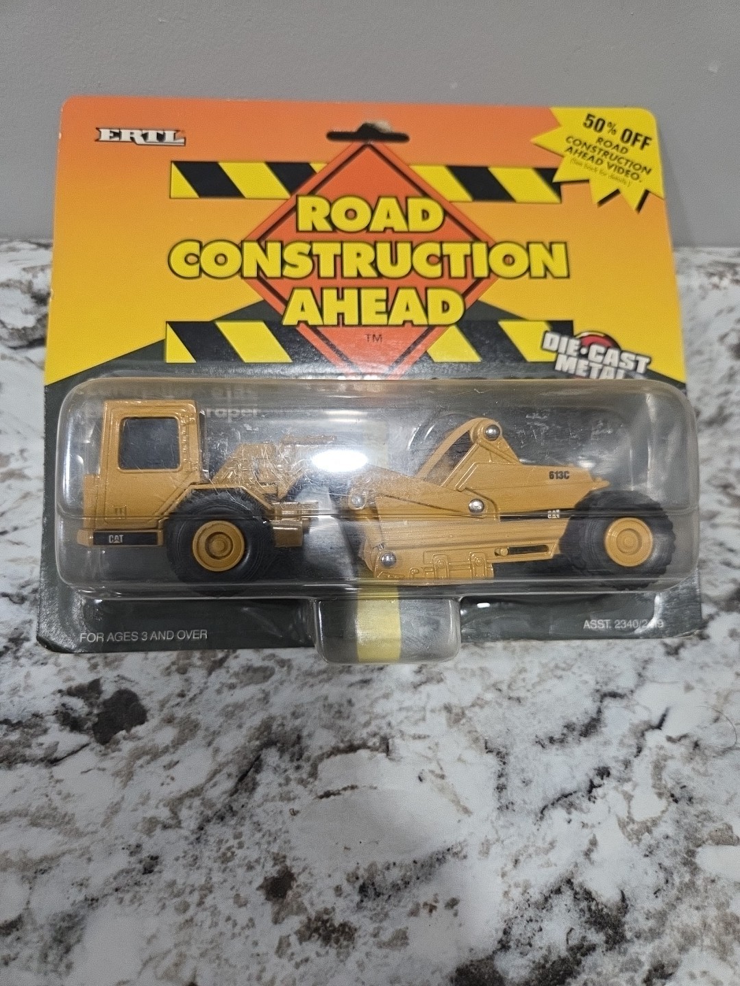 ERTL Road Construction Ahead Caterpillar 613C Elevating Scraper Die-Cast – NEW