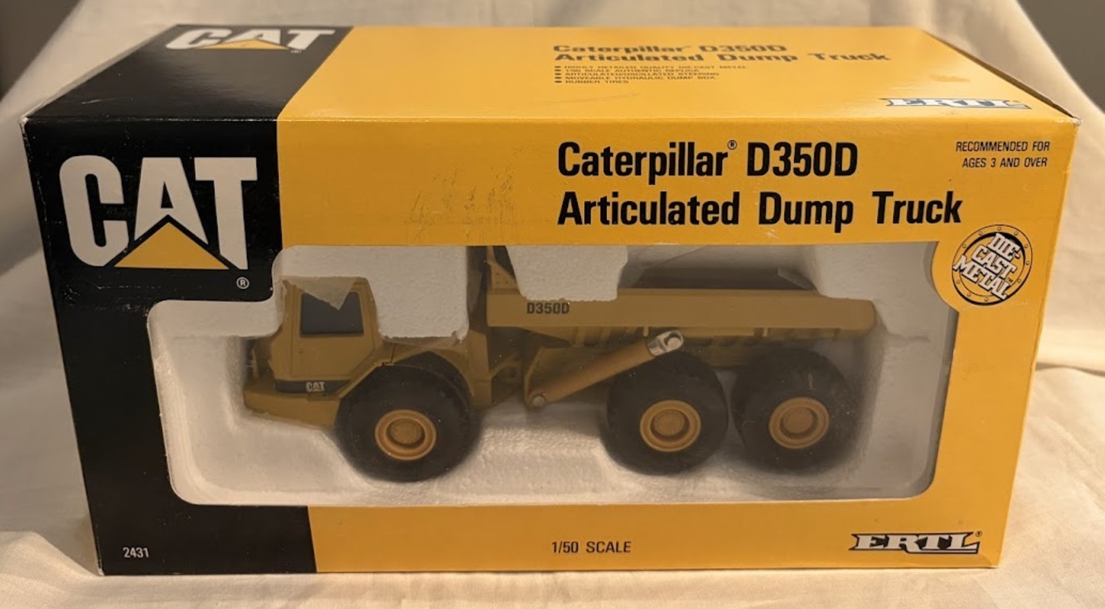 ERTL Caterpiller D350D Articulated Dump Truck New In Box