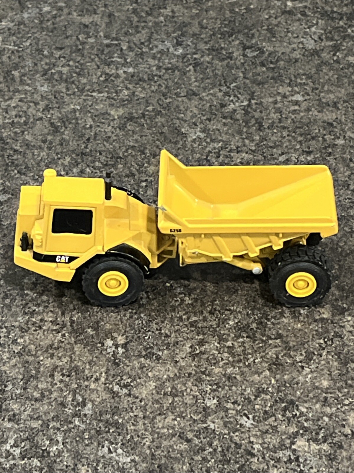 Vintage Ertl 5″ Articulated Caterpillar – D250, Rock Hauler Dump Truck – Yellow