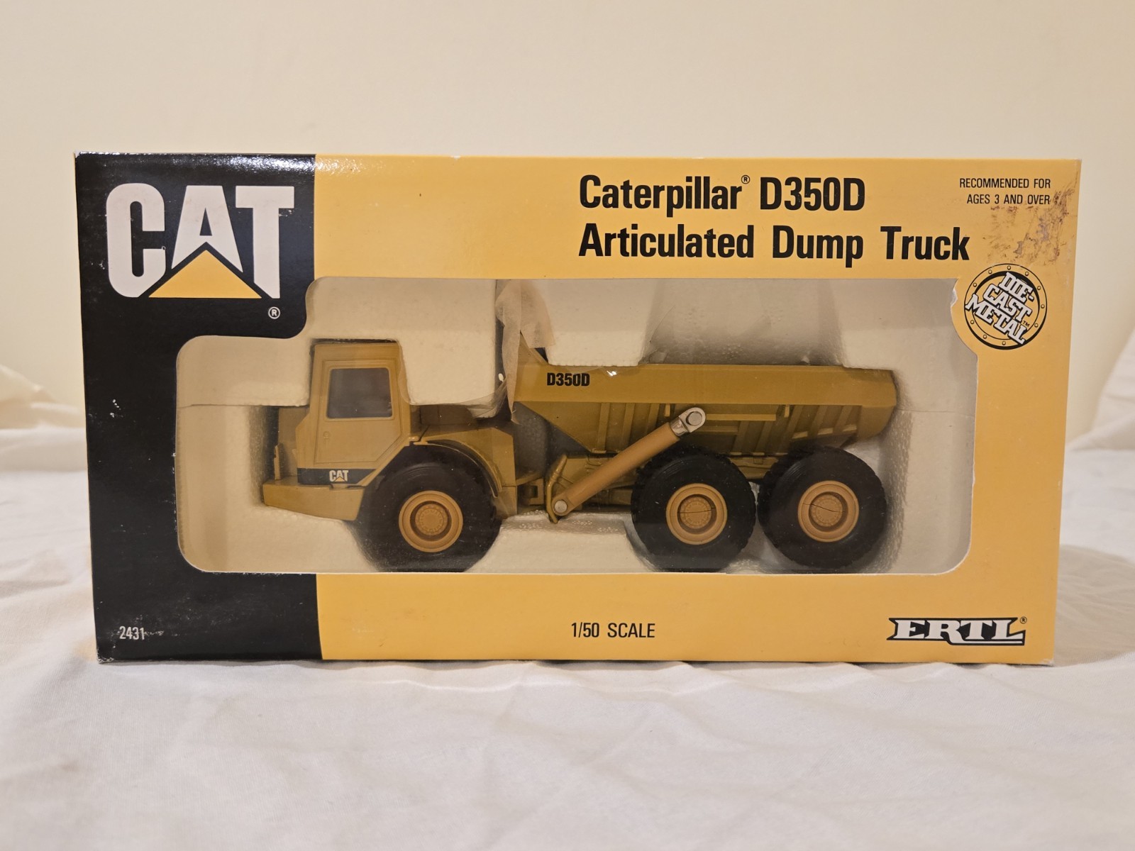 ERTL Caterpillar Cat D350D Articulating Dump Truck Die Cast Model