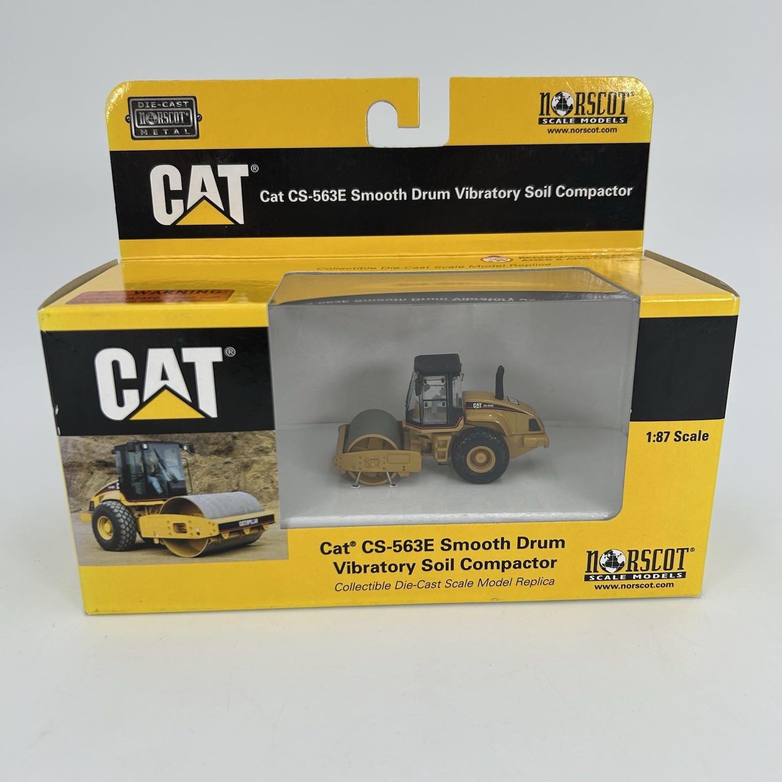 Norscot DieCast CAT CS-563E Smooth Drum Vibratory Soil Compactor 1:87 NIB