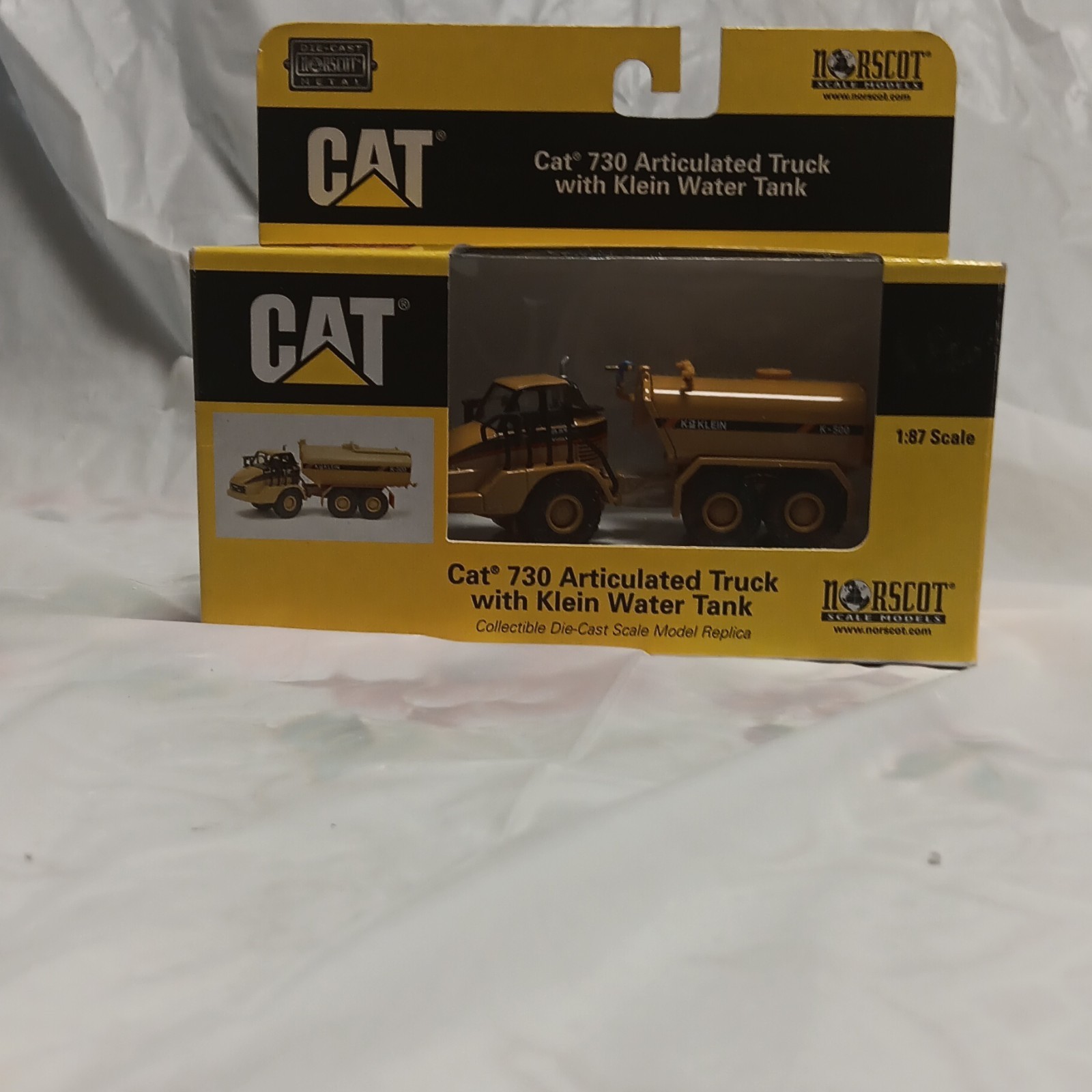 Norscot CAT 730 Articulated Truck w/ Klein Water Tank 1:87 Yellow/Black 55141
