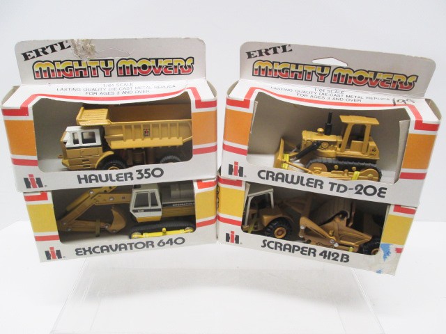 ERTL 1/64 MIGHTY MOVERS INTERNATIONAL CONSTRUCTION TOYS – LOT OF 4 – MINT-IN-BOX