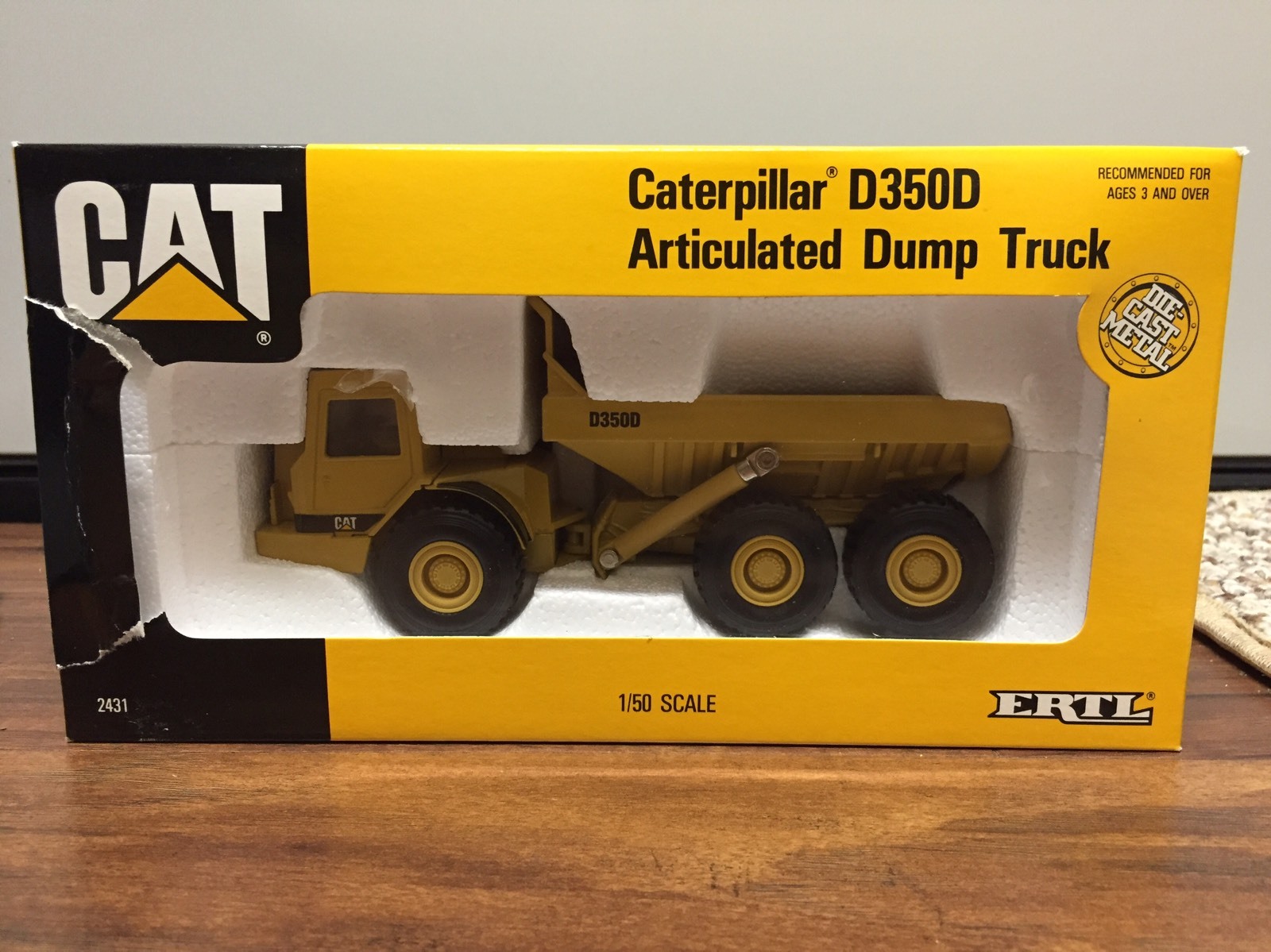 CAT D350D Articulated Dump Truck – ERTL – 1:50 – 2431
