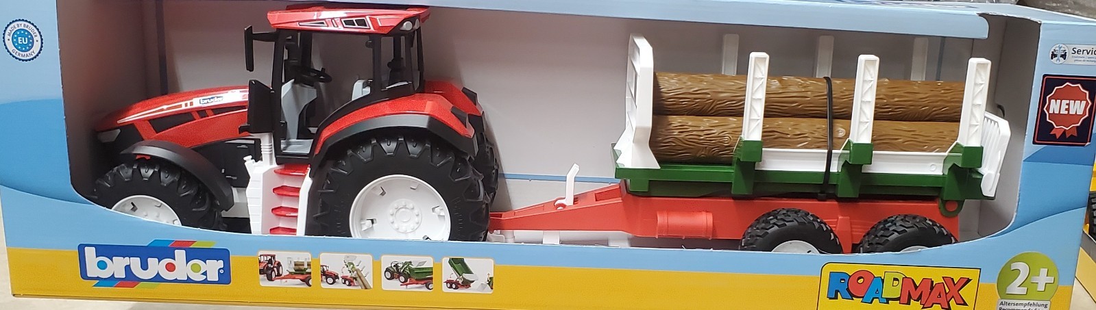 BRUDER 1/16 ROADMAX TRACTOR WITH LOG TRAILER AND 3 LOGS 03453