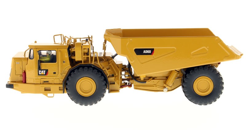 DIECAST MASTERS – CATERPILLAR AD60 dumper tunnel boring machine with driver and box met…