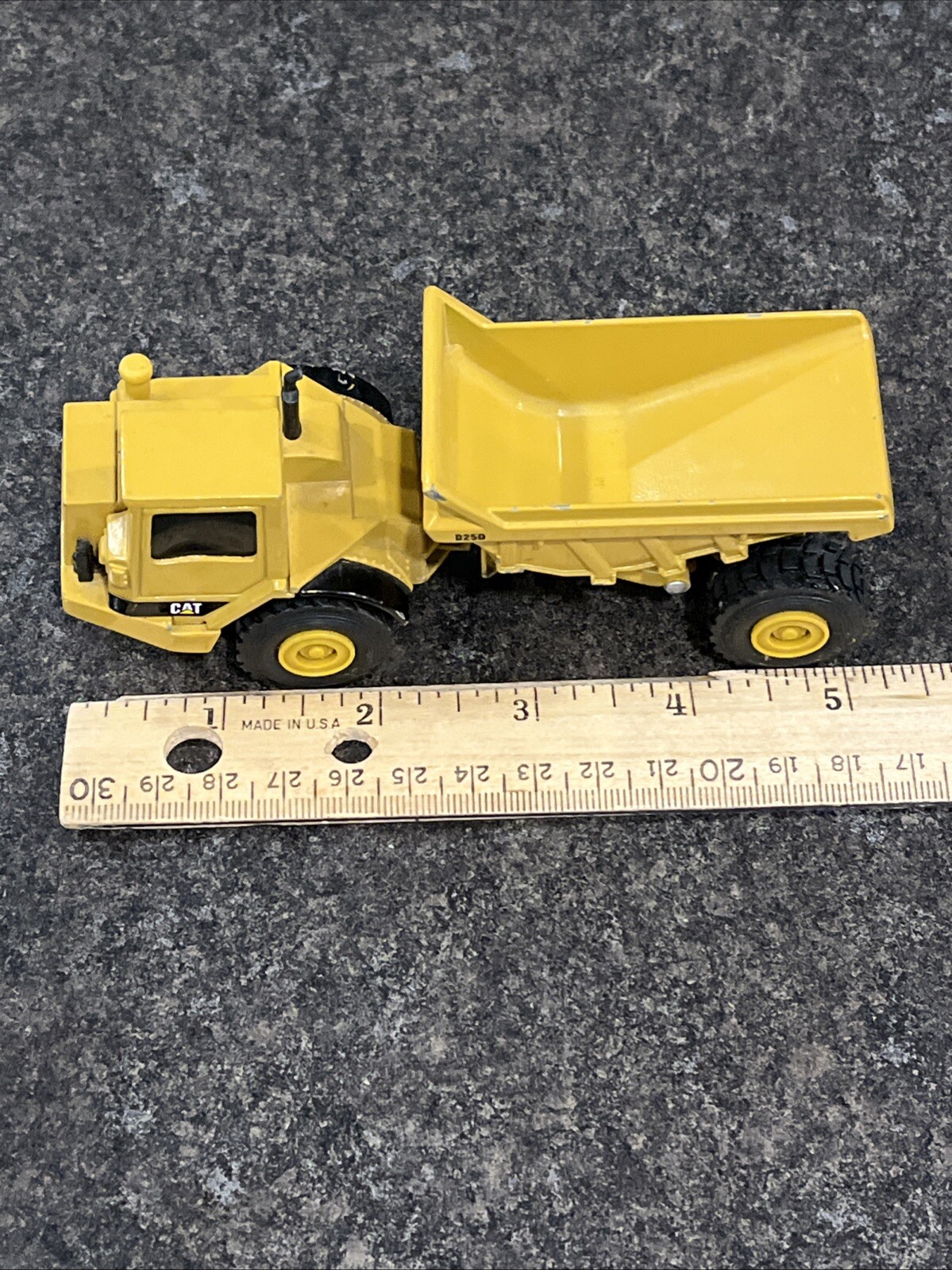 Vintage Ertl 5″ Articulated Caterpillar – D250, Rock Hauler Dump Truck – Yellow