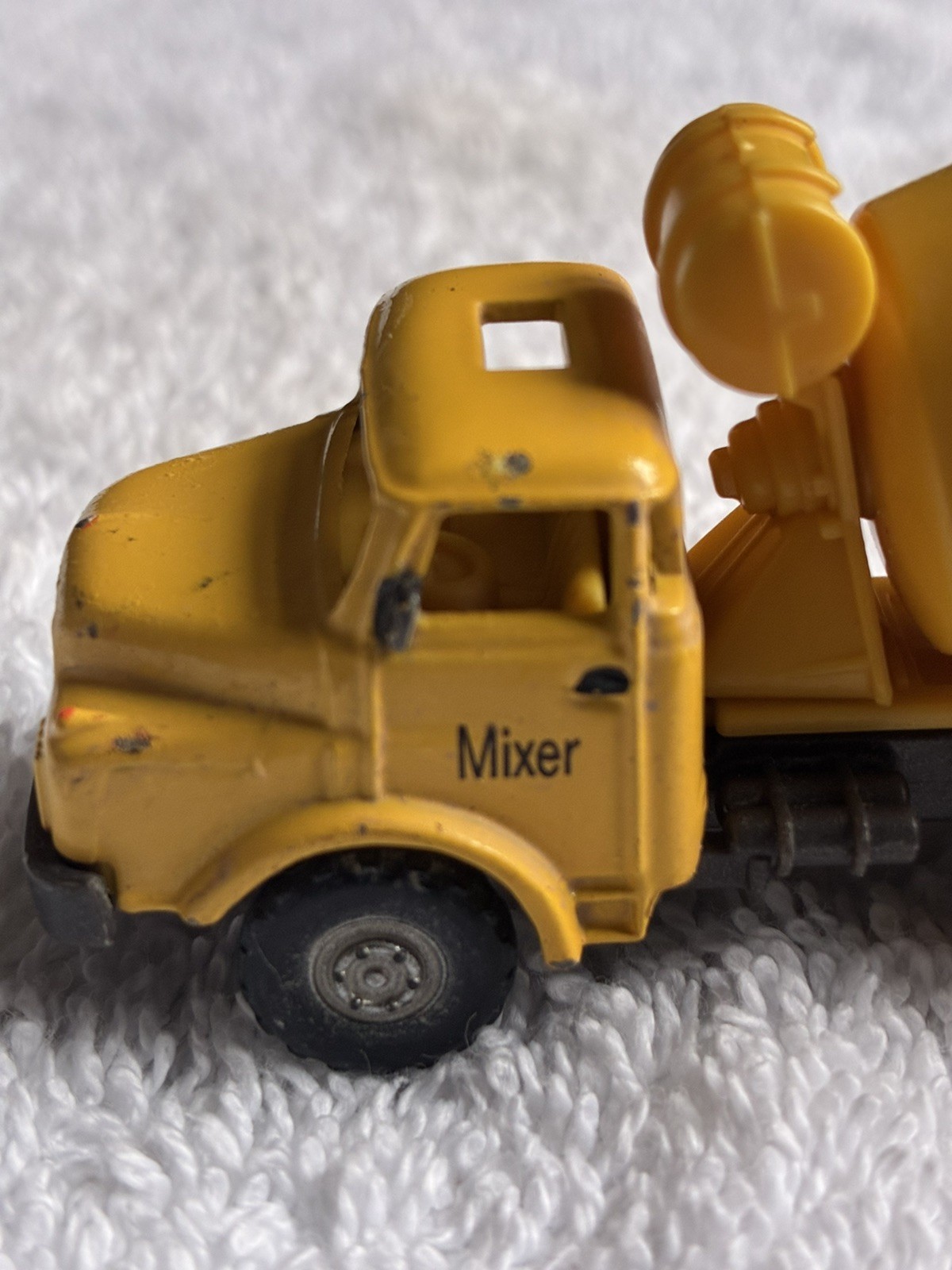 yellow 1:87 scale model cement mixer truck, manufactured by Boley or Smart