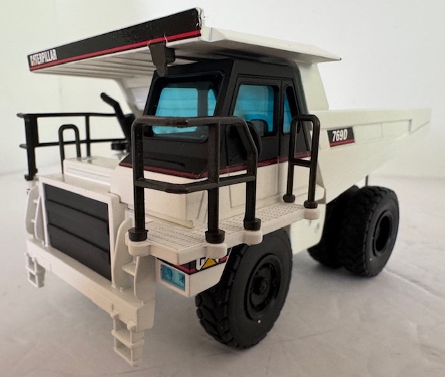 1:50 Caterpillar 769D Off Highway Dump Truck Diecast Model In White #477 By NZG
