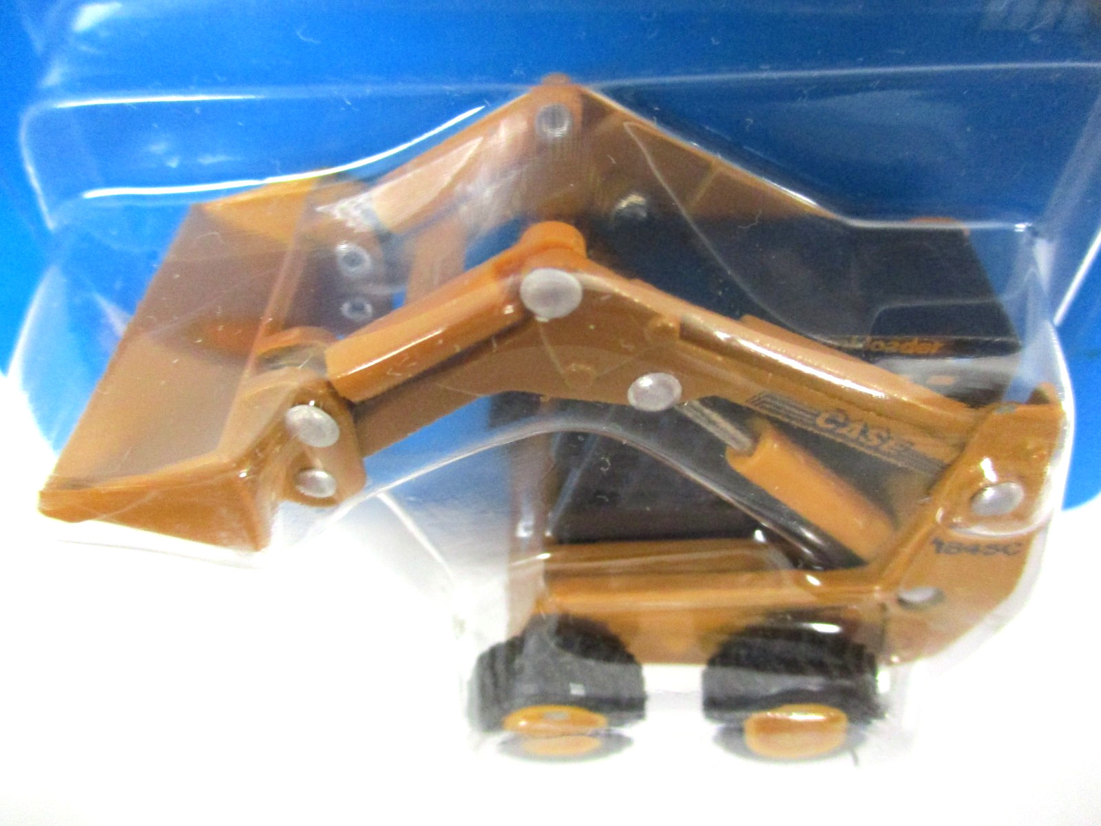 ERTL – CASE 1845C UNILOADER SKID STEER LOADER – 1/64 DIECAST