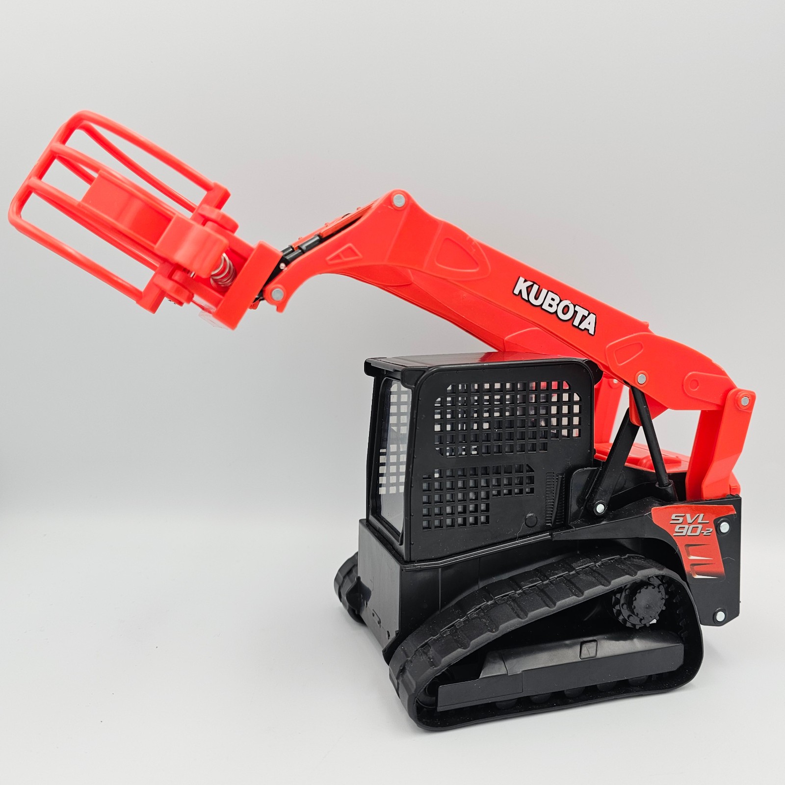 Kubota Construction Toy Skid Steer LoaderTracks SVL 90-2 New Ray Orange Grapple
