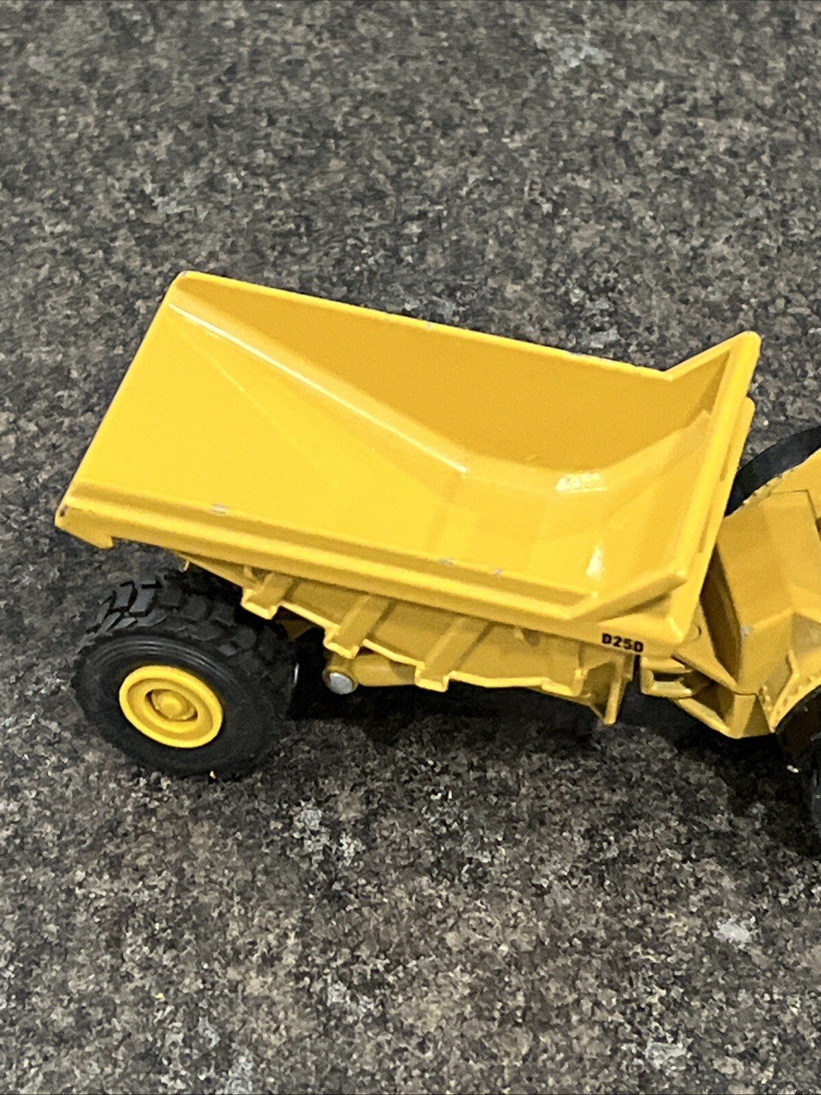Vintage Ertl 5″ Articulated Caterpillar – D250, Rock Hauler Dump Truck – Yellow