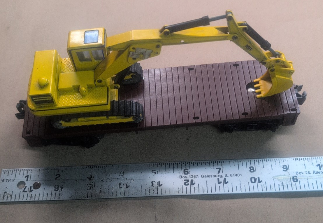 1/50 Scale Massey Ferguson MF450S Excavator on a Lionel O scale flatbed
