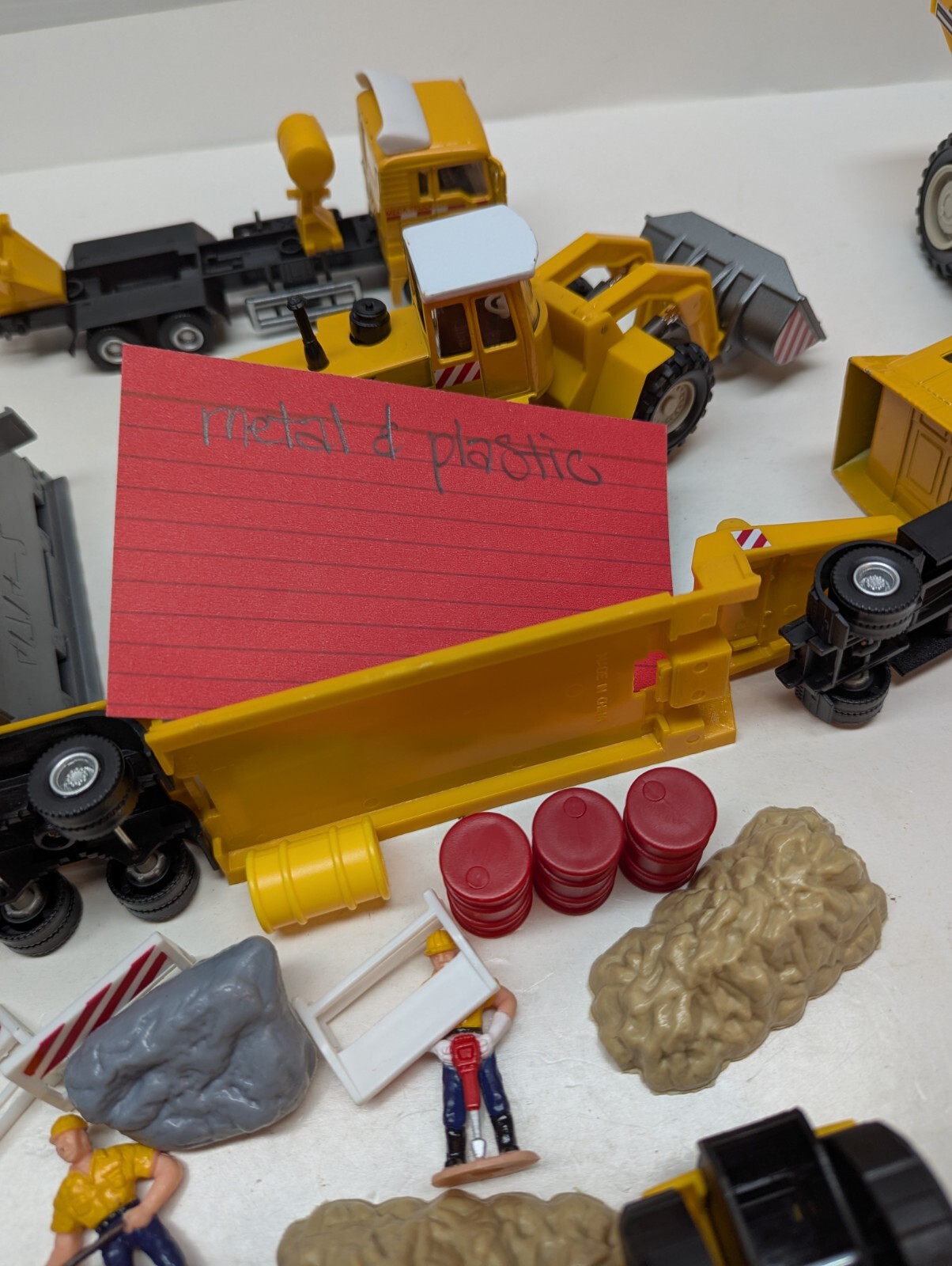 LOT OF 18 Construction Toys Trucks Men at Work Sign Rocks Steel Rolls Toy Set